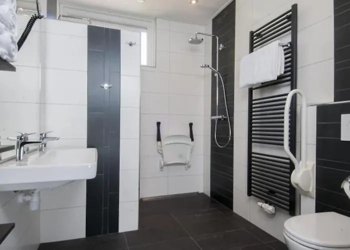 בית נופש Familiehuis De Erica - 12 P אוטרלו